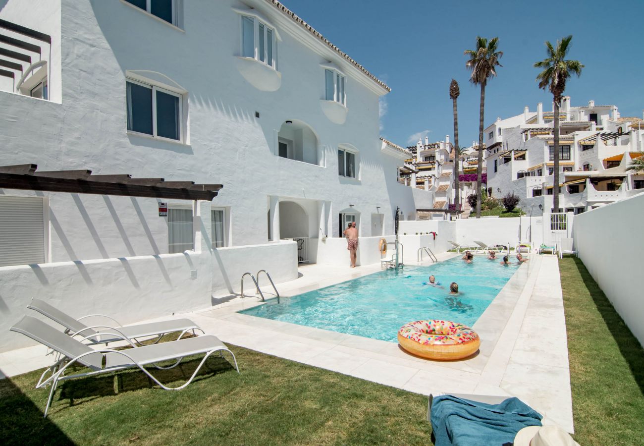 Swimming pool of open plan duplex apartment near Puerto Banus