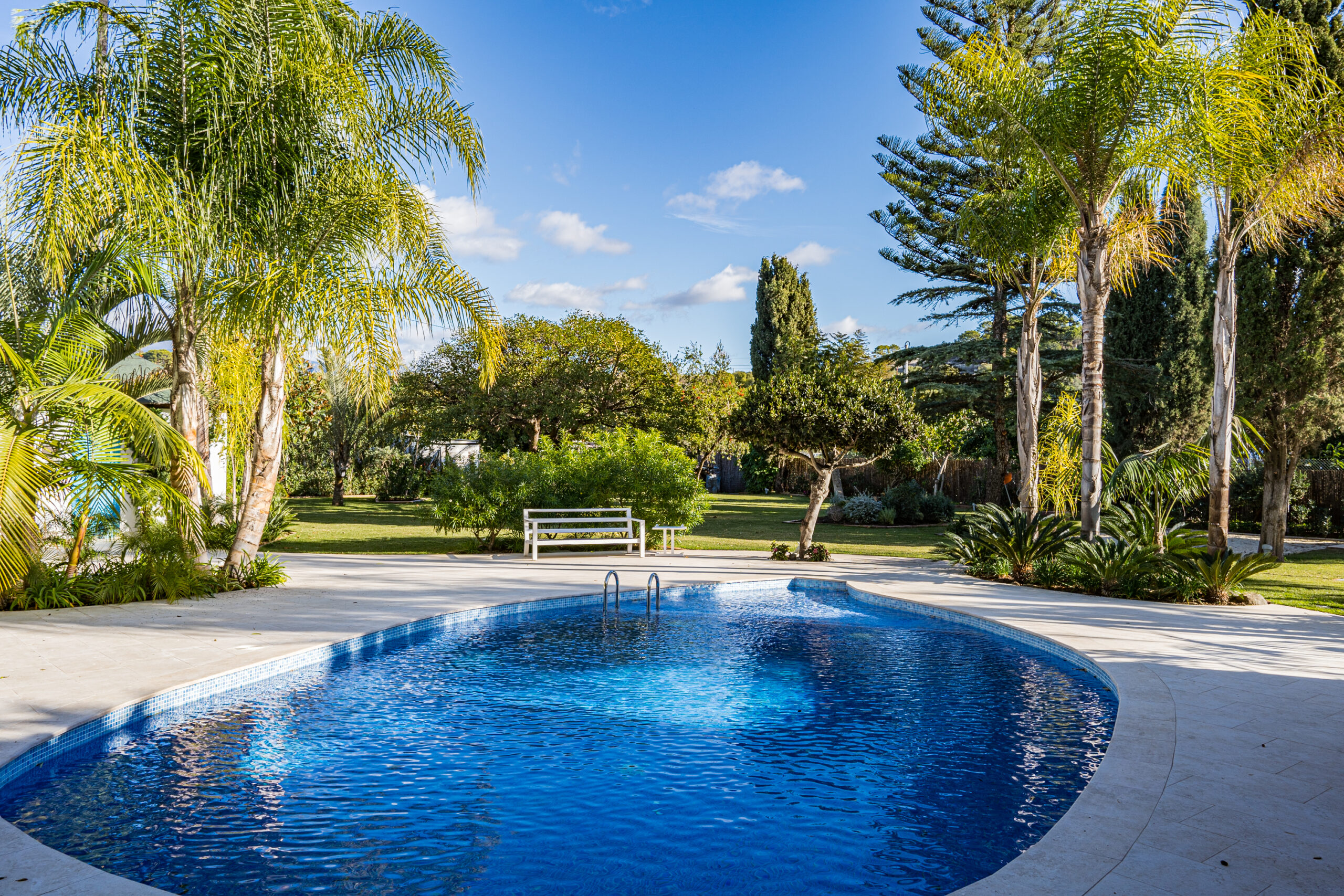 Pool renovation with new terrace and poolhouse